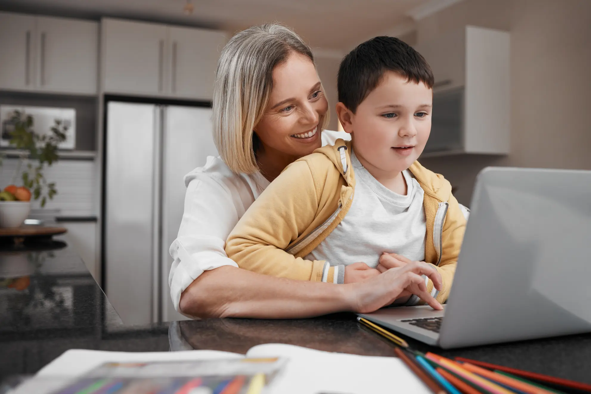 Parent and child watching a lesson together